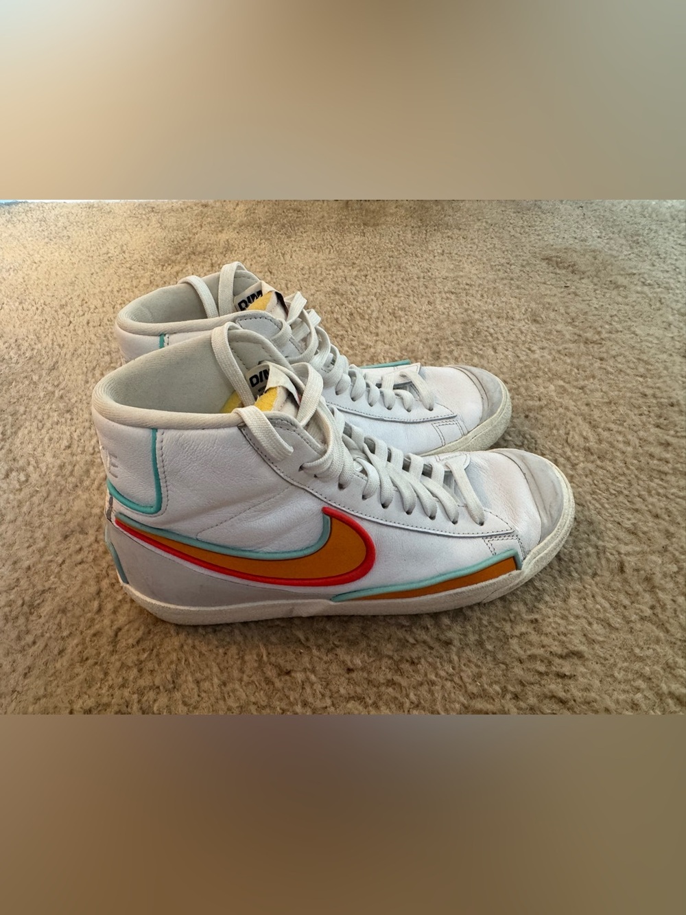Nike White High-Top Sneakers with Orange, Red & Teal Accents